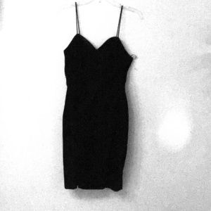 Spaghetti strap black velvet dress.
